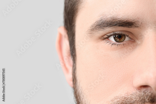 Young man with hazel eyes o...