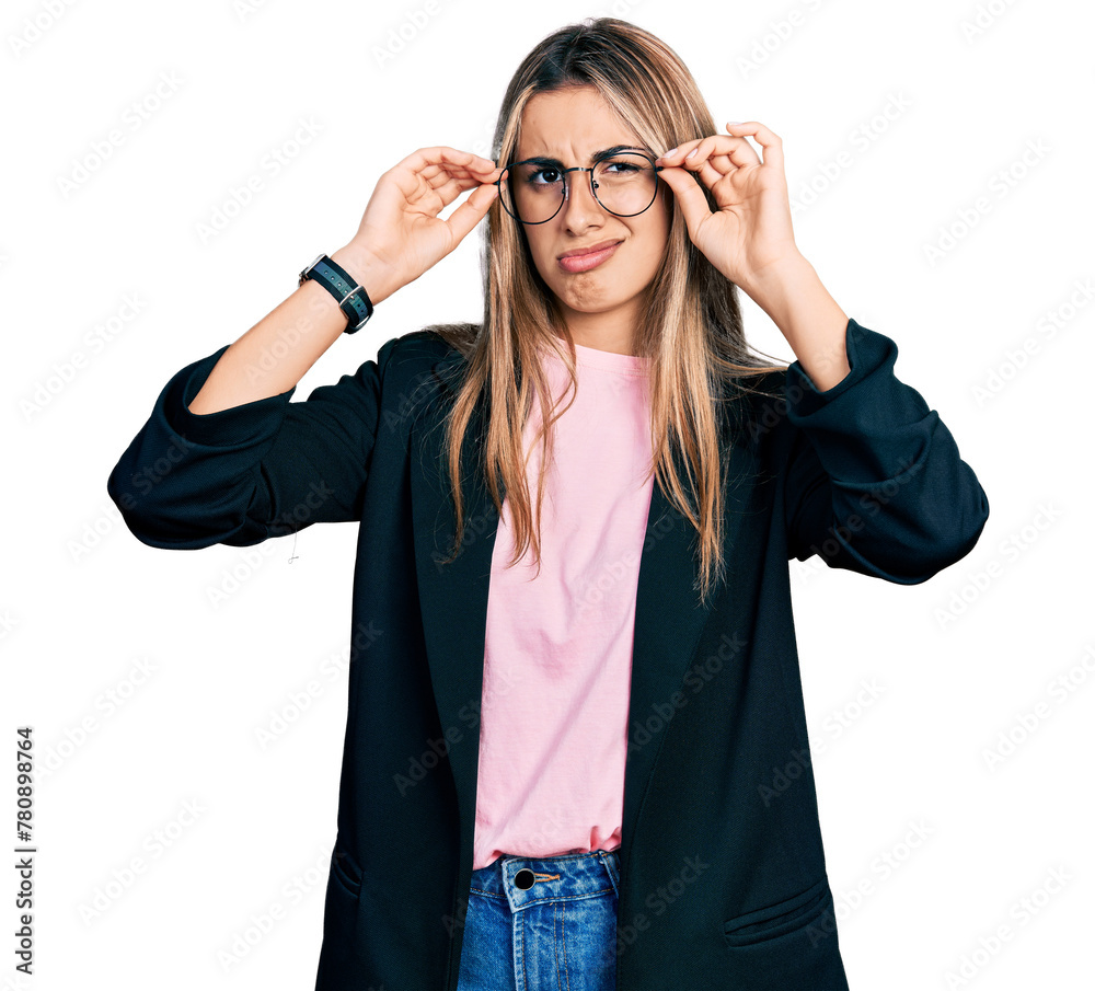 Hispanic young woman wearing elegant jacket and glasses clueless and confused expression. doubt concept. Hispanic young woman wearing elegant jacket and glasses clueless and confused expression. doubt concept.