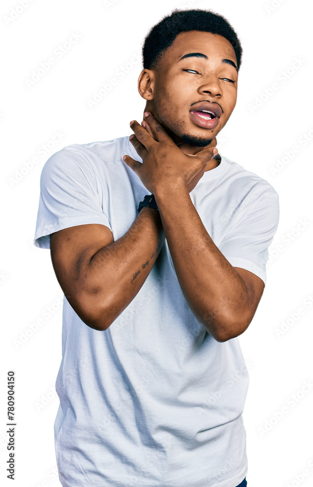 Young african american man wearing casual white t shirt shouting suffocate because painful strangle. health problem. asphyxiate and suicide concept. Young african american man wearing casual white t shirt shouting suffocate because painful strangle. health problem. asphyxiate and suicide concept.