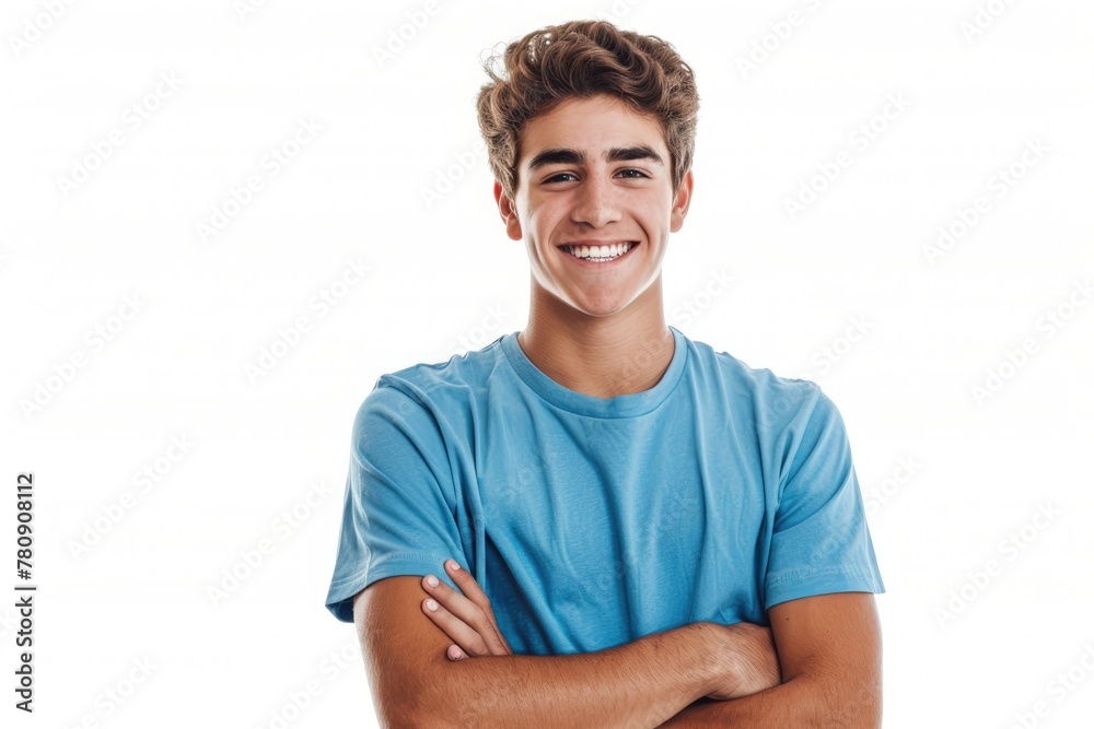 Smiling handsome young man in T-shirt standing with crossed arms isolated on white background. Smiling handsome young man in T-shirt standing with crossed arms isolated on white background.