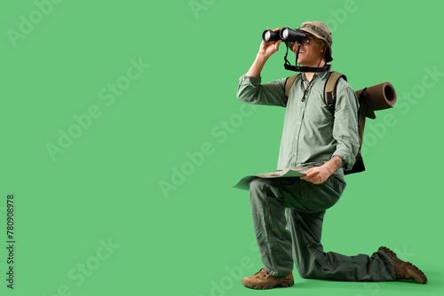 Male traveler with map look...