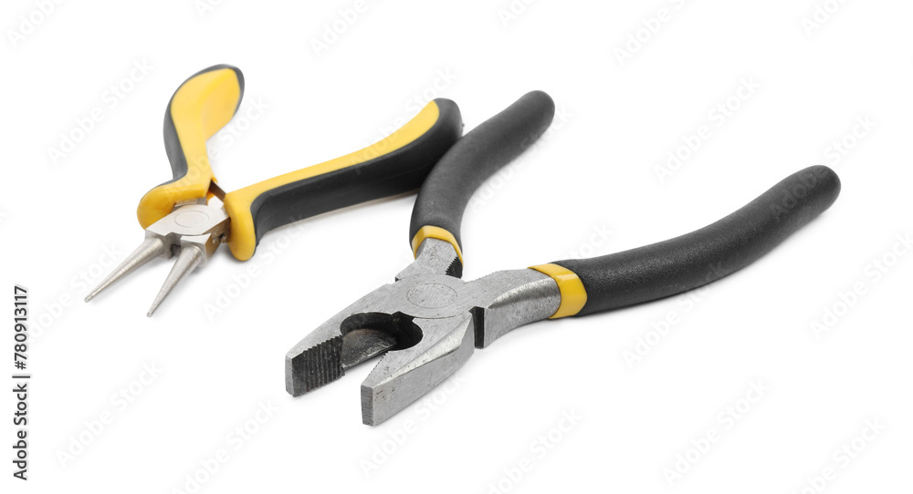 Different pliers isolated on white. Construction tool Different pliers isolated on white. Construction tool