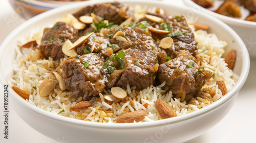 Authentic traditional iraqi biryani plate with spiced lamb, savory basmati rice, almonds, and exotic middle eastern spices, cooked to perfection in authentic iraqi culinary tradition