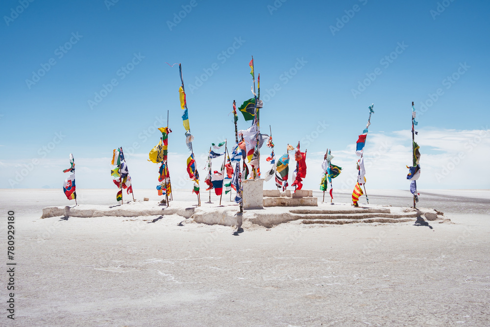 International flags at the Dakar monument on the Salar de Uyuni salt flats in Bolivia International flags at the Dakar monument on the Salar de Uyuni salt flats in Bolivia