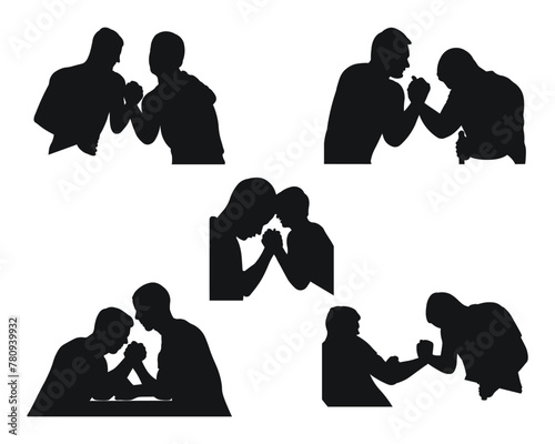 Men compete in arm wrestling. Isolated silhouettes on white background