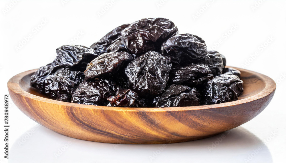 Prunes in wooden bowl isolated on white background Prunes in wooden bowl isolated on white background