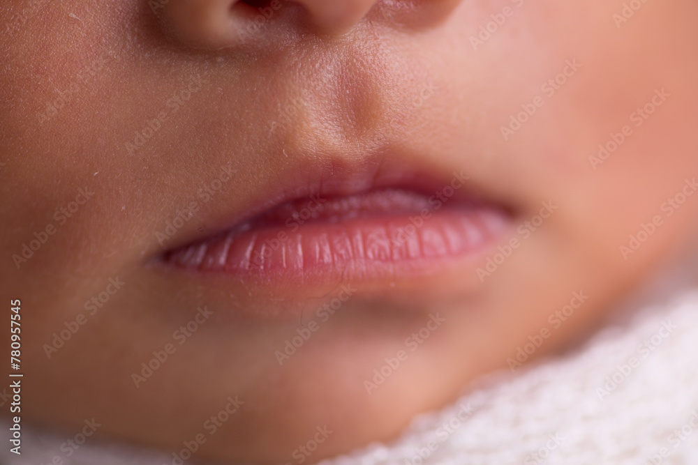 Naklejka premium Little tiny newborn human baby tenderness