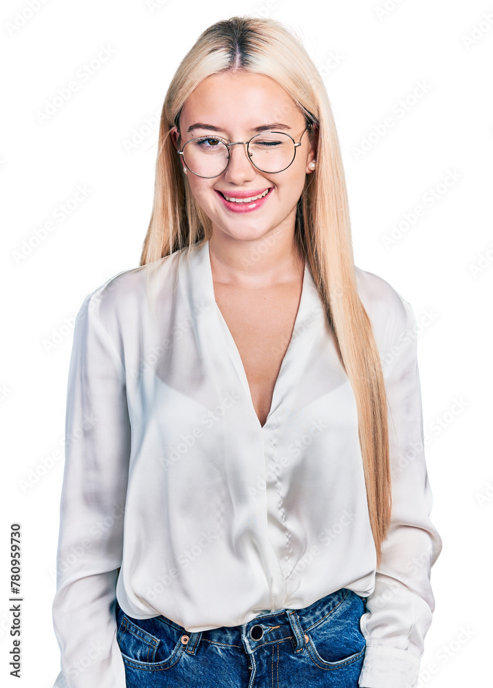 Beautiful blonde woman wearing elegant shirt and glasses winking looking at the camera with sexy expression, cheerful and happy face. Beautiful blonde woman wearing elegant shirt and glasses winking looking at the camera with sexy expression, cheerful and happy face.