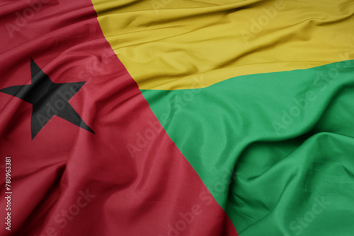 waving colorful national flag of guinea bissau.