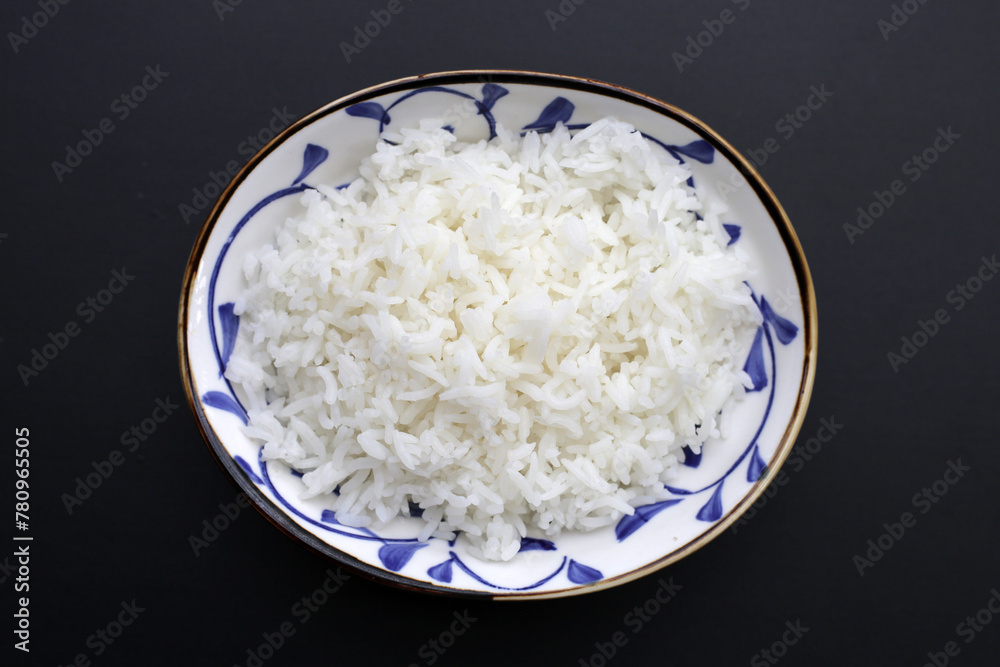 Cooked rice in white bowl Cooked rice in white bowl