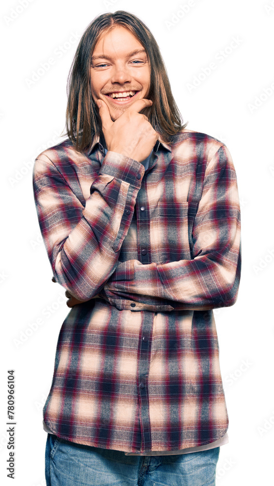 Handsome caucasian man with long hair wearing hipster shirt looking confident at the camera smiling with crossed arms and hand raised on chin. thinking positive. Handsome caucasian man with long hair wearing hipster shirt looking confident at the camera smiling with crossed arms and hand raised on chin. thinking positive.