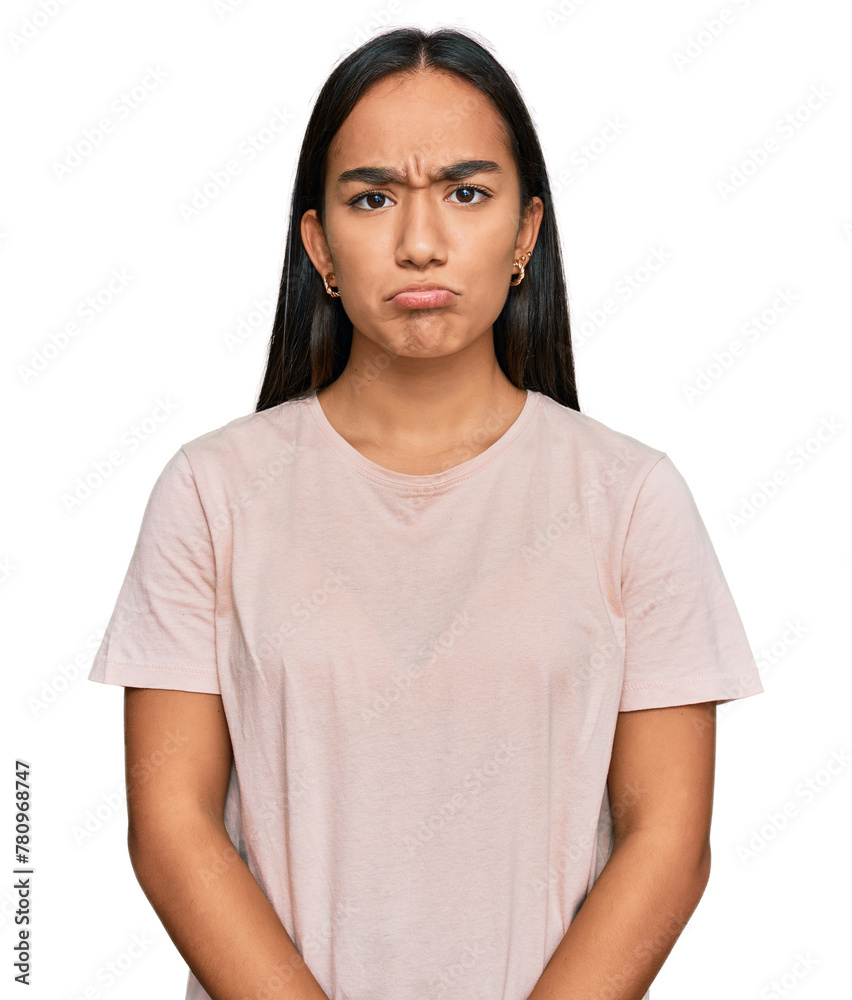 Young asian woman wearing casual clothes depressed and worry for distress, crying angry and afraid. sad expression.