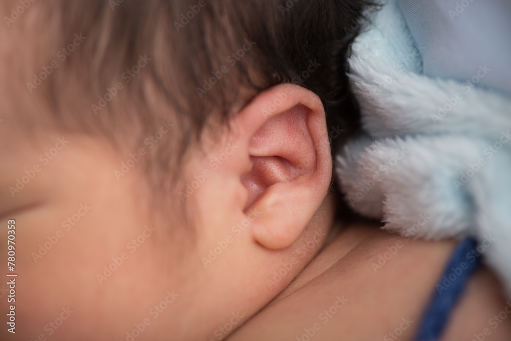 Close up macro photography of a newborn baby ear person attention listen Close up macro photography of a newborn baby ear person attention listen