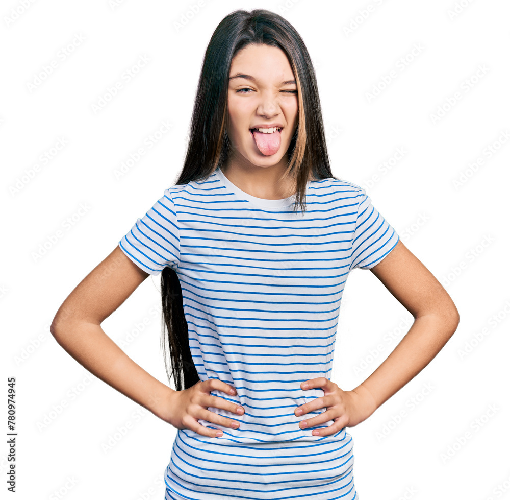Young brunette girl with long hair with arms akimbo sticking tongue out happy with funny expression. Young brunette girl with long hair with arms akimbo sticking tongue out happy with funny expression.