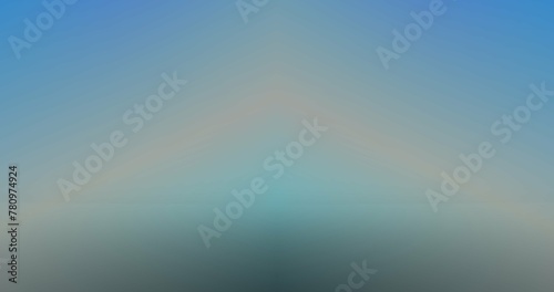 The image is a blurred gradient of blue-green and light grey.