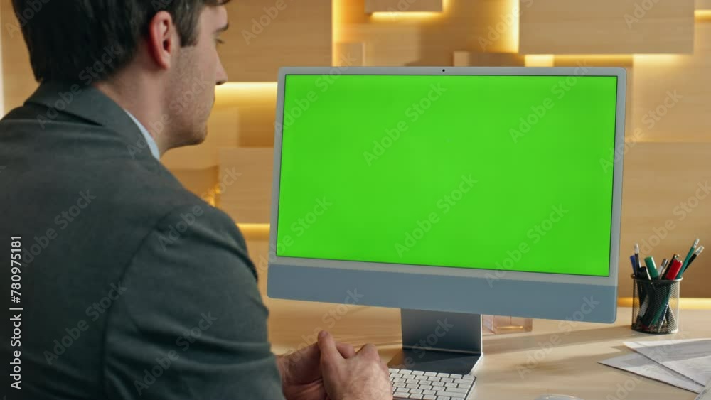 Director videocalling chromakey computer at desk workplace closeup. Man talking