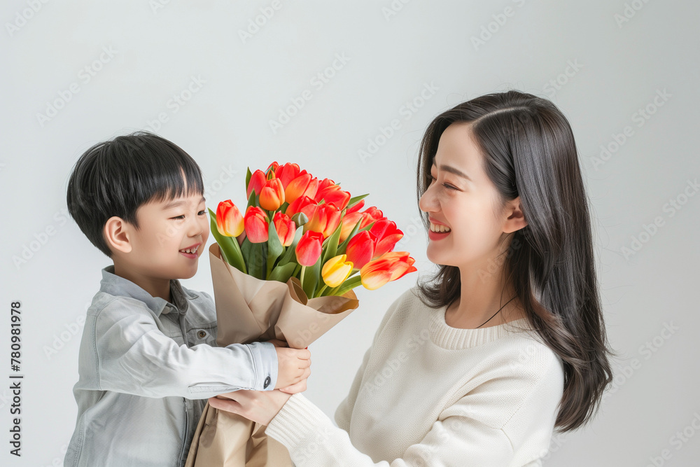 Happy Mother's Day Celebration with Asian Mother and Child and Flowers Happy Mother's Day Celebration with Asian Mother and Child and Flowers
