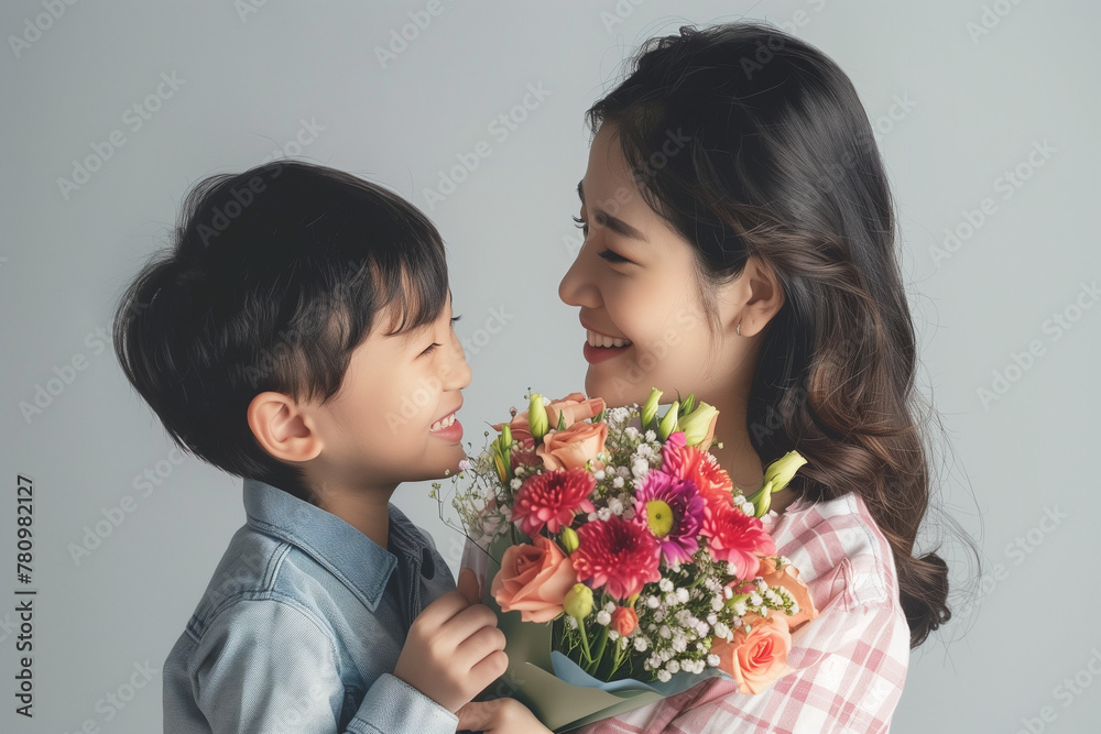 Happy Mother's Day Celebration with Asian Mother and Child and Flowers Happy Mother's Day Celebration with Asian Mother and Child and Flowers