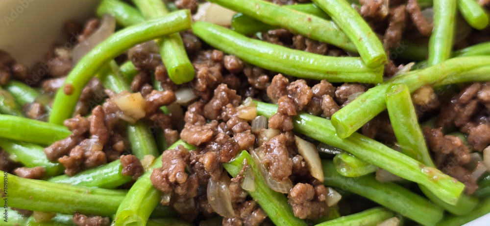 String green bean or french beans with minced beef stir fry or sauteed called Tumis buncis daging sapi cincang in Indonesia String green bean or french beans with minced beef stir fry or sauteed called Tumis buncis daging sapi cincang in Indonesia