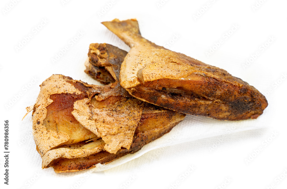 Fried pomfret on white background. Pomfret fish is gutted, thoroughly cleaned, and marinated in salt and black pepper. Use a high fire to fry. Eat with rice or on your own. For design ideas, there are