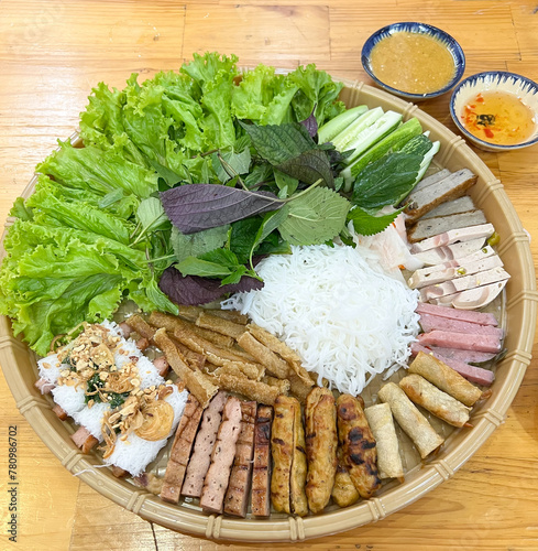 Bun dau mam tom or Vermicelli with shrimp paste. A traditional Northern Vietnamese dish. It has distinct smells that only locals can enjoy. It is a combination plate with cooked pork ribs, fried tofu,