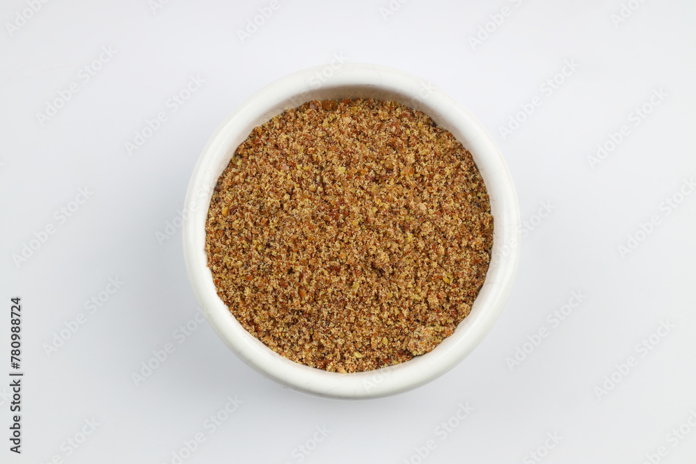 Pile of flax seeds isolated on white background