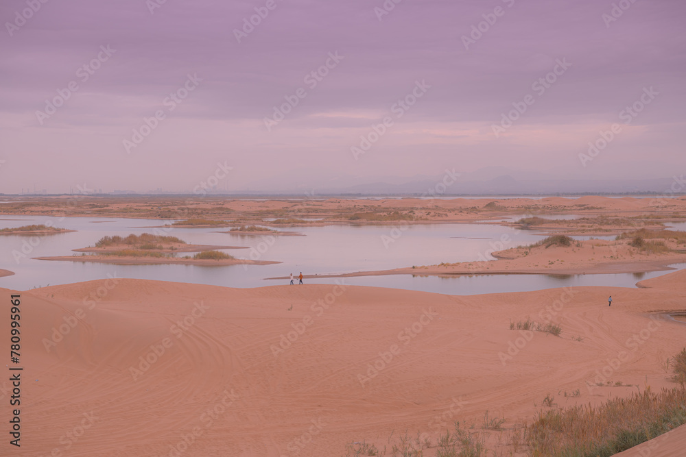 The river going through the desert in Wuhai, Inner Mongolia, China The river going through the desert in Wuhai, Inner Mongolia, China