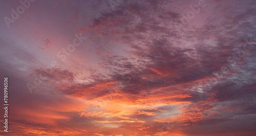 Panoramic view of sunset golden and blue sky nature background. Colorful dramatic sky with cloud at sunset.Sky background.Sky with clouds at sunset. © pinglabel