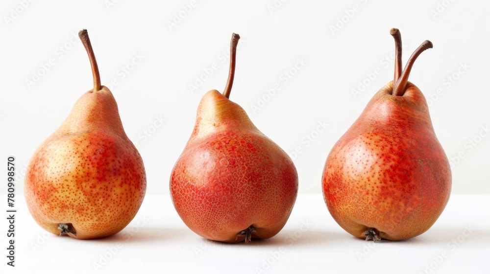 Three pears on white surface Three pears on white surface