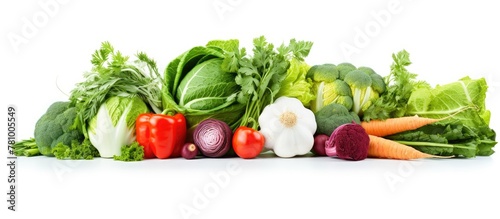 Assorted vegetables including tomatoes, carrots, and broccoli, photographed up close on a clean white background