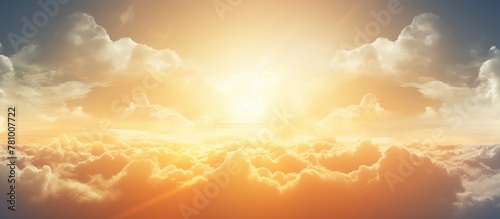 Fototapeta Naklejka Na Ścianę i Meble -  The sun shining brightly in a close-up view above a sky filled with fluffy white clouds