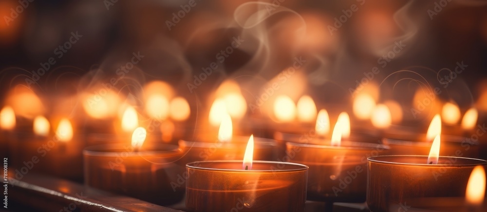 Arrangement of candles in a row inside a church, creating a serene ambiance Arrangement of candles in a row inside a church, creating a serene ambiance