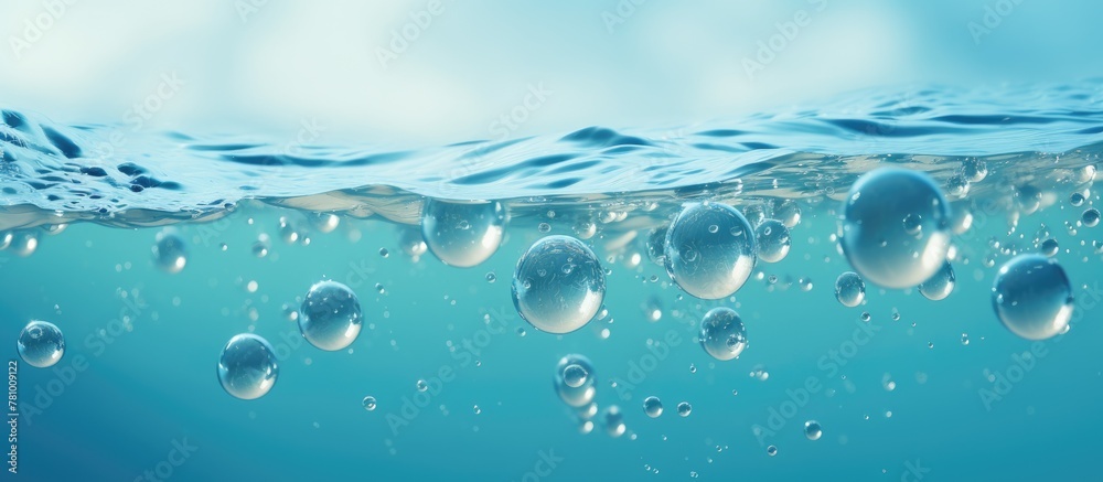 Ripples cascade through a deep blue ocean as small bubbles sway gently in the water, creating a serene and enchanting scene Ripples cascade through a deep blue ocean as small bubbles sway gently in the water, creating a serene and enchanting scene