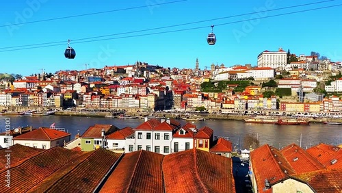 Porto, Portugal. Panoramic view of the old town and Douro river. Tourist cable car over the promenade. Famous travel destination
 photo