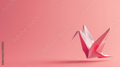 Pink background with white and pink paper origami crane