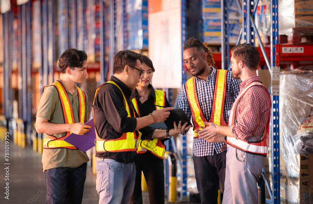 A group of warehouse employees, Inspecting products on warehouse shelves before they are sent to retailer