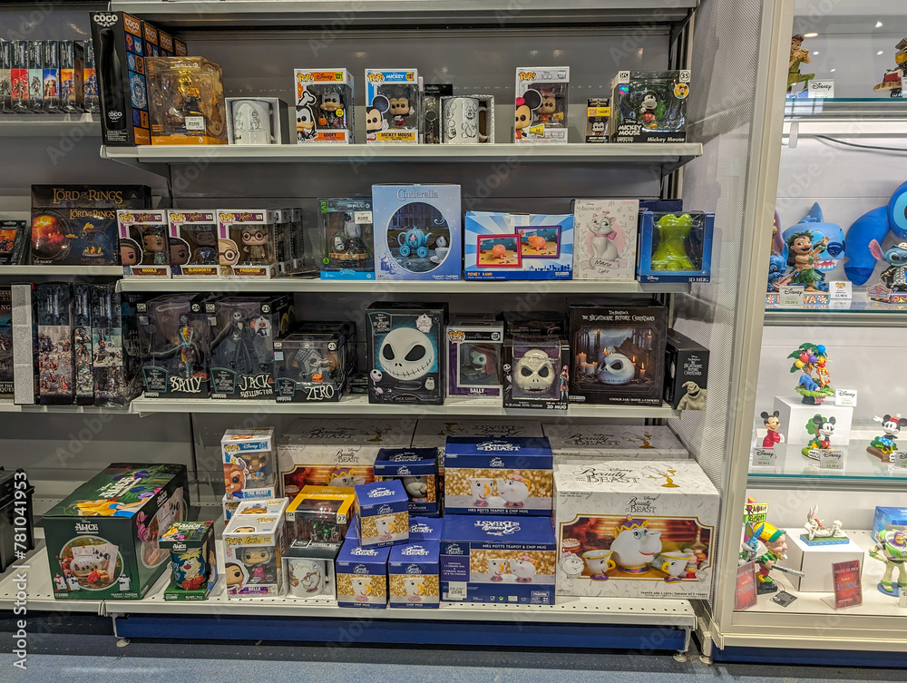 Fototapeta premium France, 16 March 2024: Collectibles and Toy Figurines on Display Shelves.