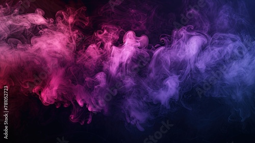 Smoke that is thick and purple against a backdrop of black isolation photo