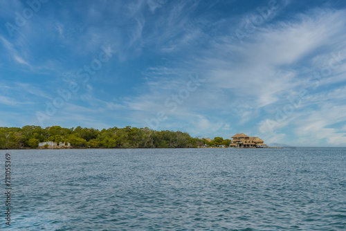 Palma island seen from a boat with sea and blue sky. San Bernardo Colombia.  © camaralucida1