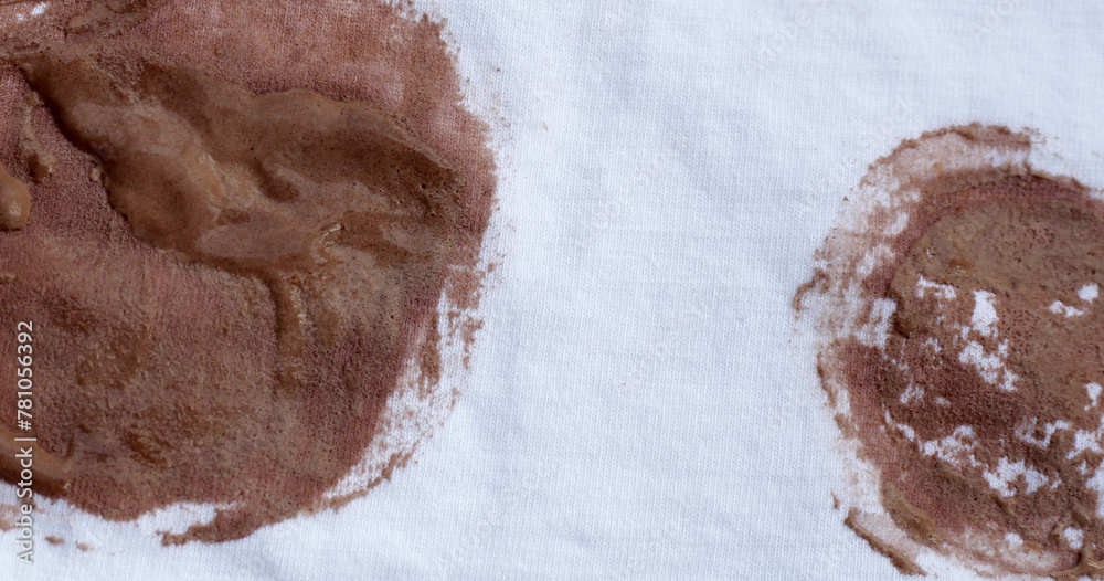 Fototapeta premium Dirty stain chocolate ice cream on white clothes