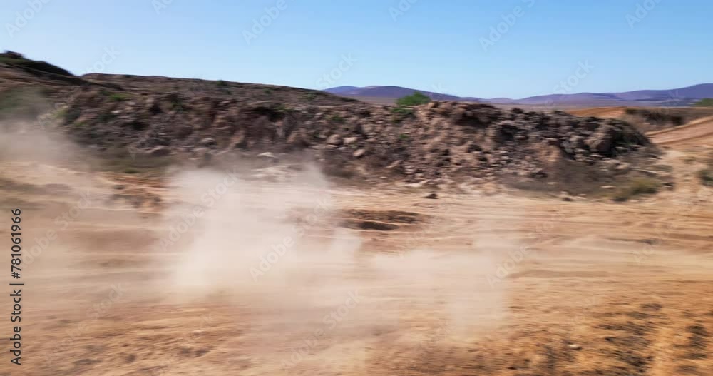 Biker person, motorcycle or turn on dirt road in speed, motorcross or balance as safety challenge. Pro rider, motorbike or practice by risk, energy or fast action in racing, power or adventure Biker person, motorcycle or turn on dirt road in speed, motorcross or balance as safety challenge. Pro rider, motorbike or practice by risk, energy or fast action in racing, power or adventure