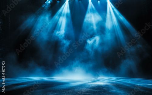 A stage with blue lights and smoke