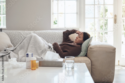Tableau sur toile Woman, sick and headache with medication on sofa for flu, cold or sinus in living room at home