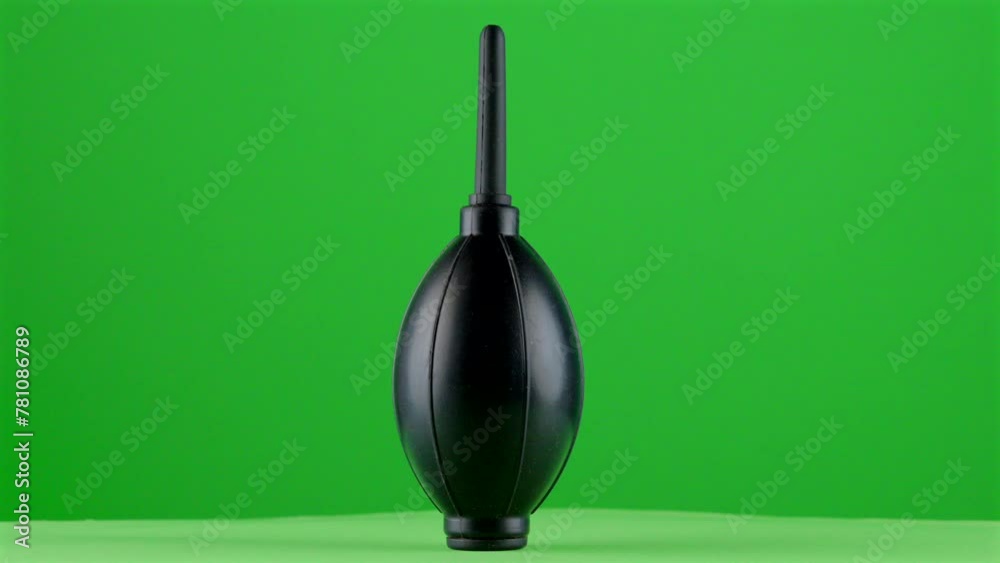 photography videography blower rocket soft air enema on green background chroma key background replacement backdrop objet in a turntable 3d spinning loop