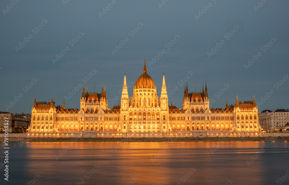 Obraz premium Incredible front view on Parliament building in Budapest with fantastic perfect sky and reflection in water. calm Danube river. Popular Travel destinations. creative image used as background.