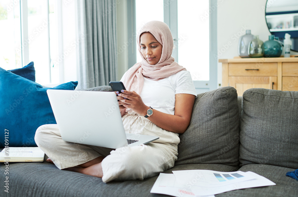 Remote work, sofa and Muslim woman on laptop and phone for online project, job and research. Working from home, business and person with tech for website, internet and planning for freelance career Remote work, sofa and Muslim woman on laptop and phone for online project, job and research. Working from home, business and person with tech for website, internet and planning for freelance career