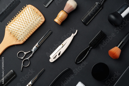 Variety of Hair Styling Tools and Accessories Displayed on a Dark Background