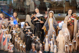 Souvenirs representing the Virgin sold in shops in Lourdes (France)