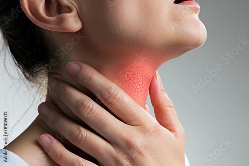 Person is experiencing a sore throat, depicting the discomfort and irritation of a throat ailment, medical attention for soothing relief and recovery, discomfort, colds disease virus bacteria photo