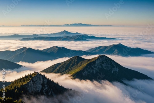 Mountains emerge above inversion layer fog